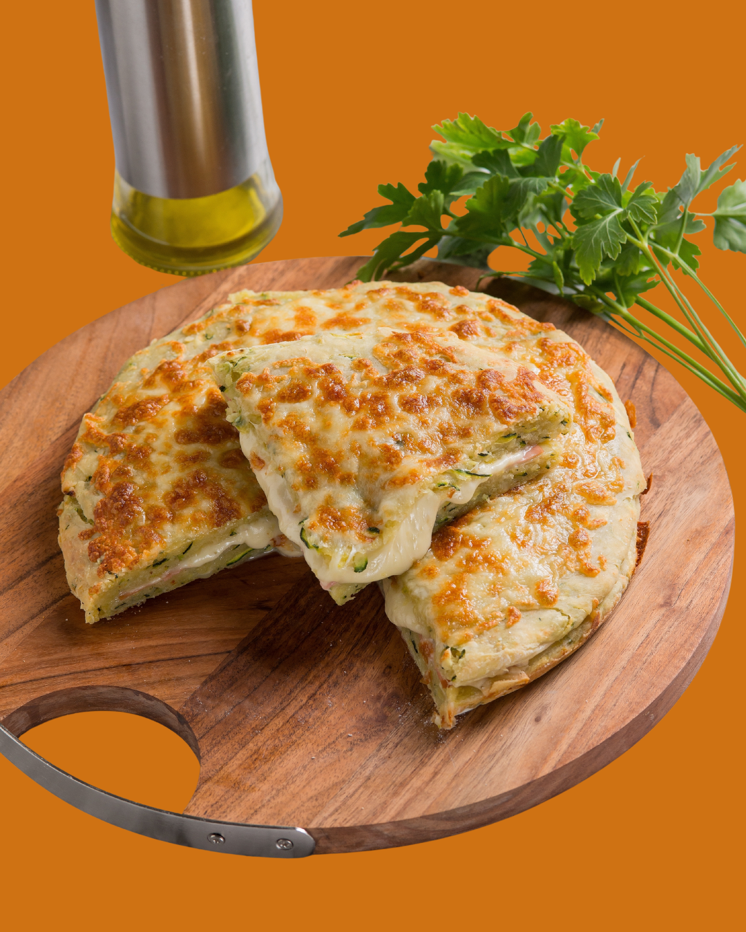 Tortilla Gratinada de Calabacín y Jamón